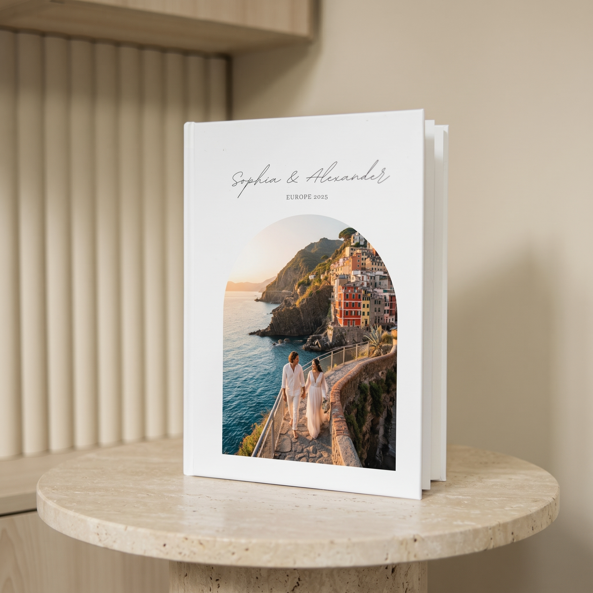 Custom travel photo book cover personalized with names and destination