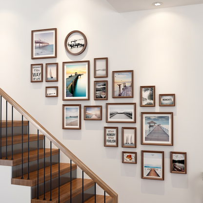 Stairway gallery wall frame set displayed along a staircase with family photos